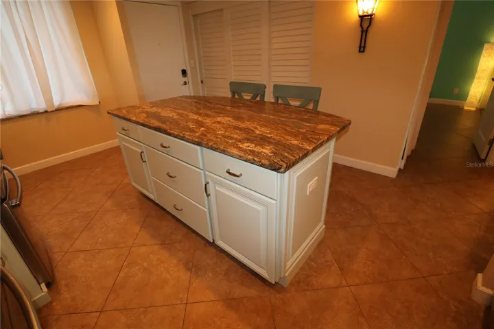 Island has additional cabinet storage