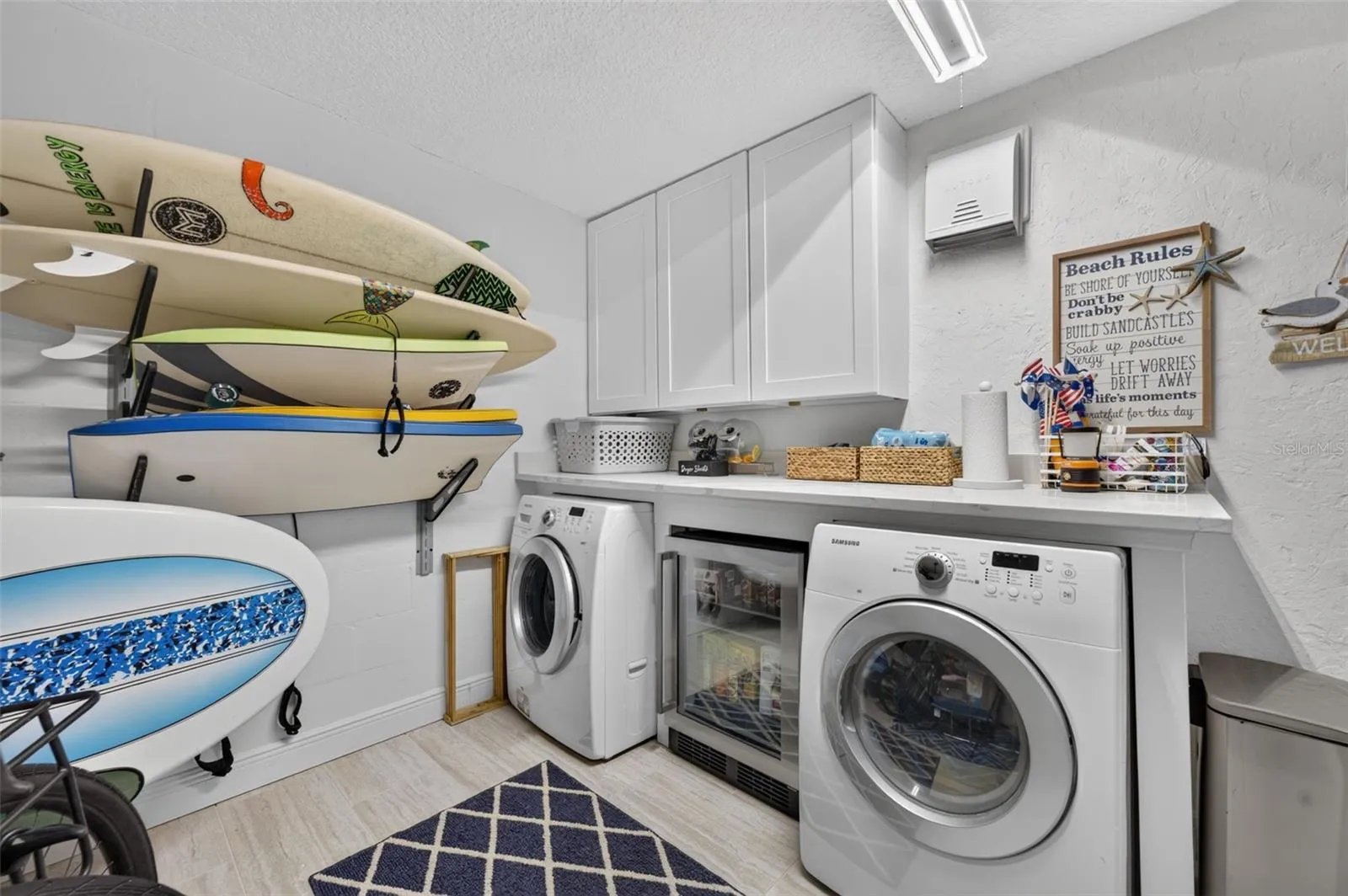 First floor laundry area/storage/one car garage.