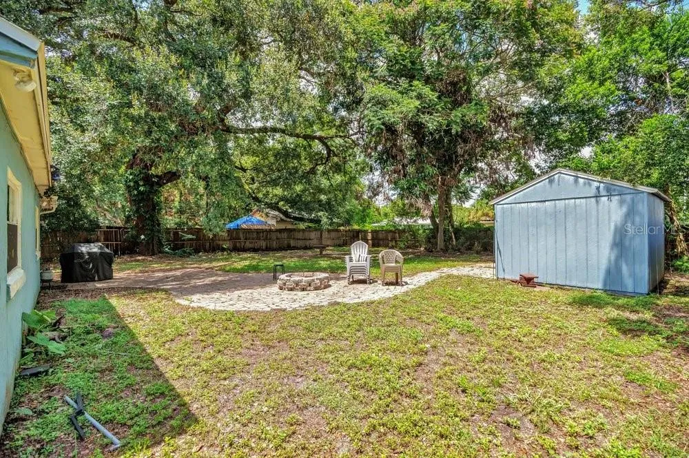 Fenced in and Pavered Backyard