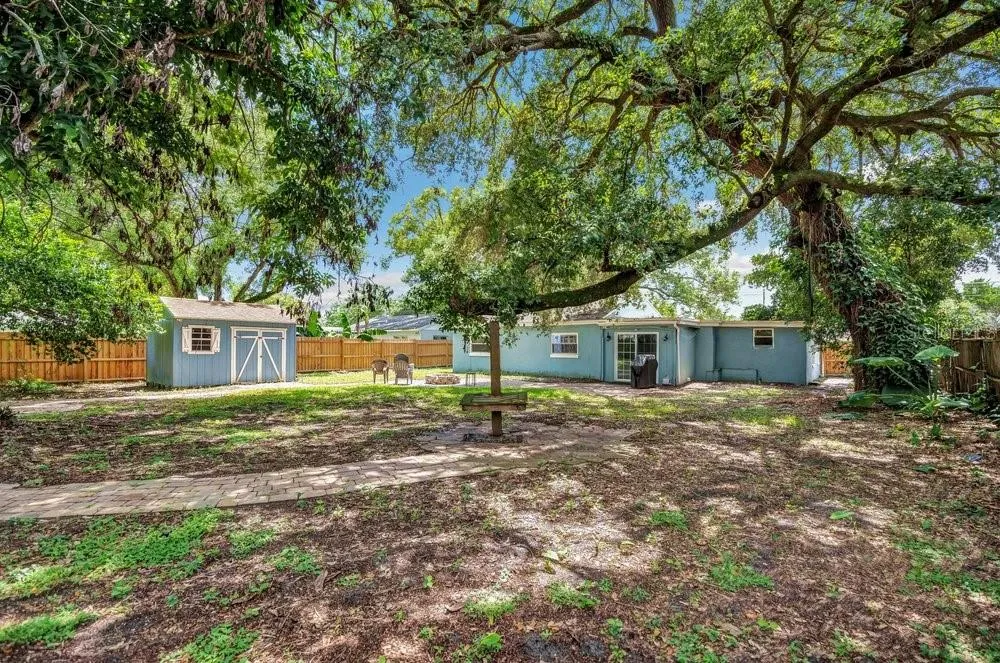 Fenced in and Pavered Backyard