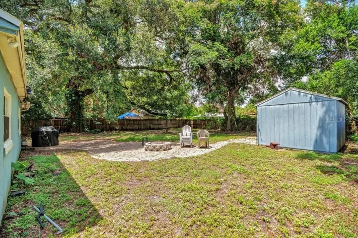 Fenced in and Pavered Backyard