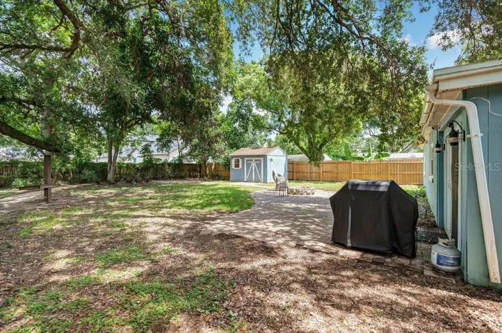 Fenced in and Pavered Backyard