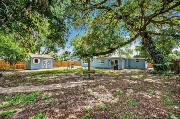 Fenced in and Pavered Backyard