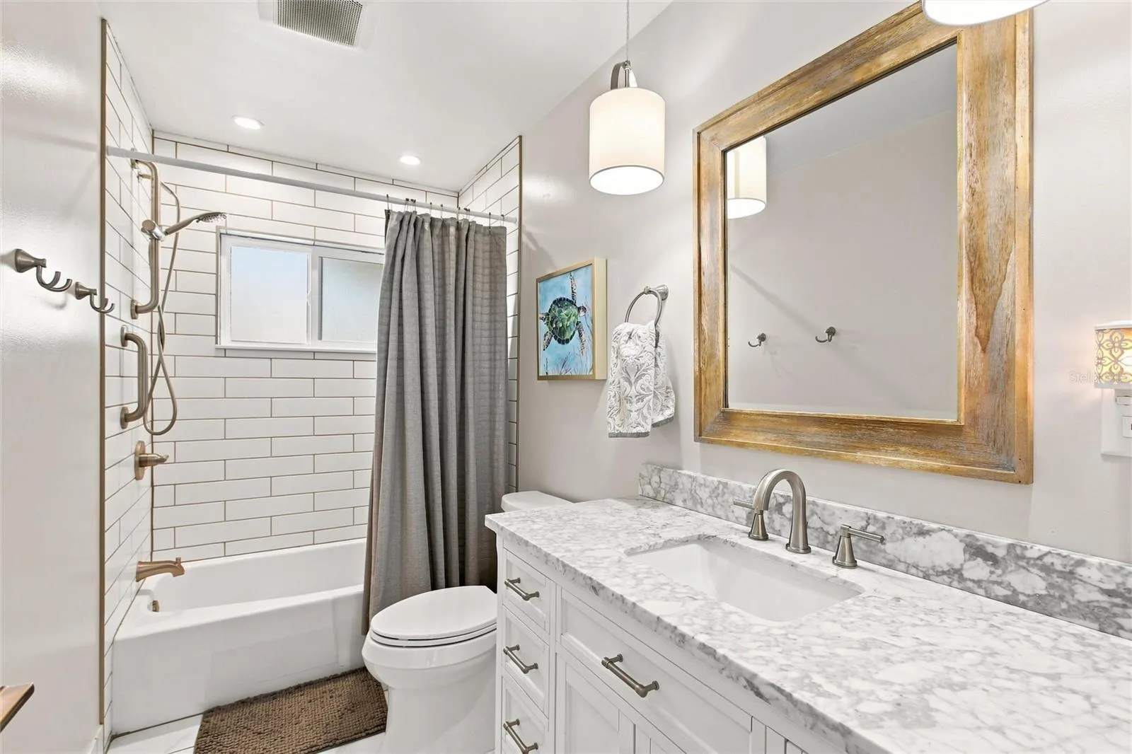 Guest Bathroom with tub and tile shower