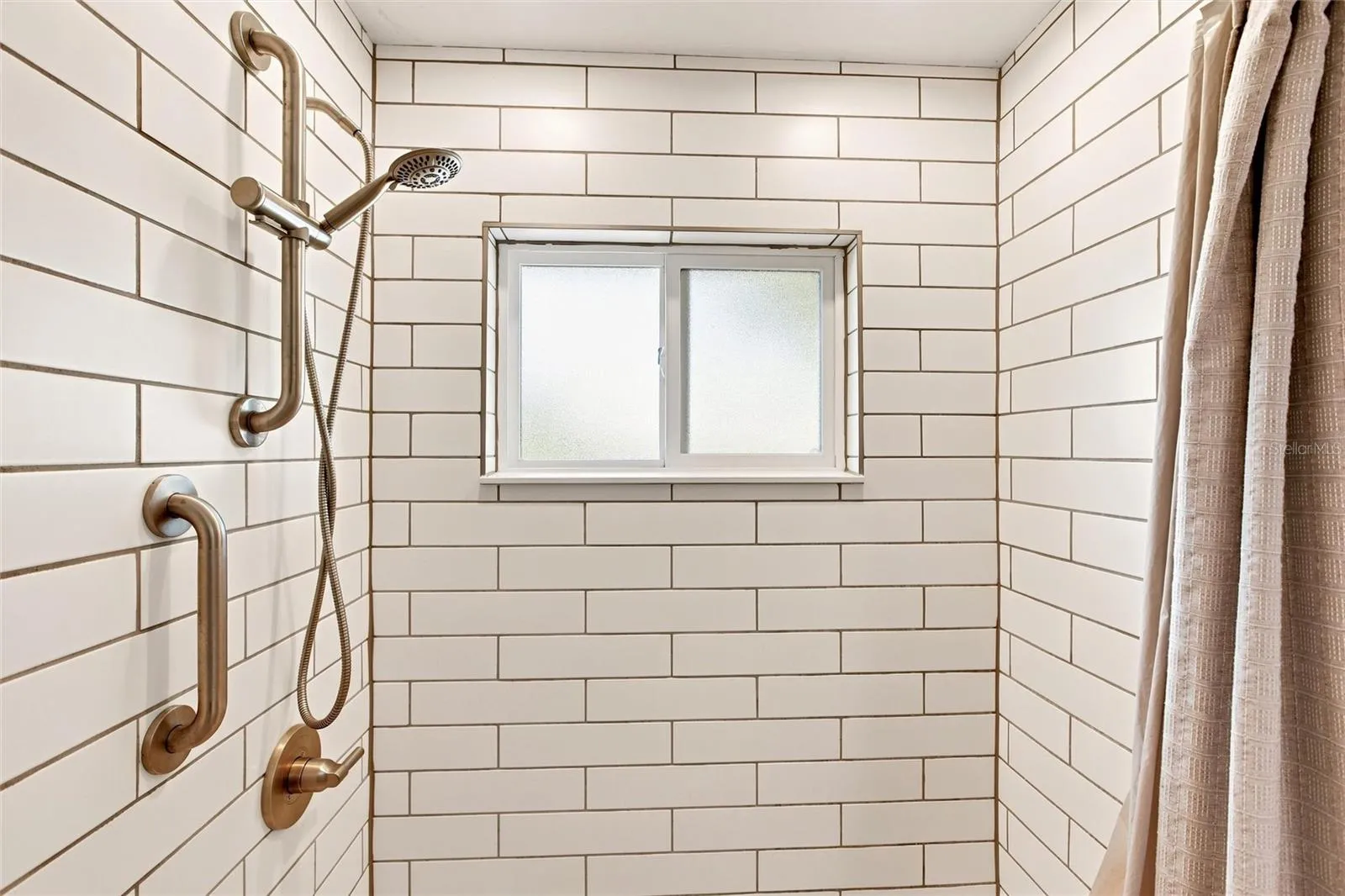 Guest Bathroom with tub and tile shower