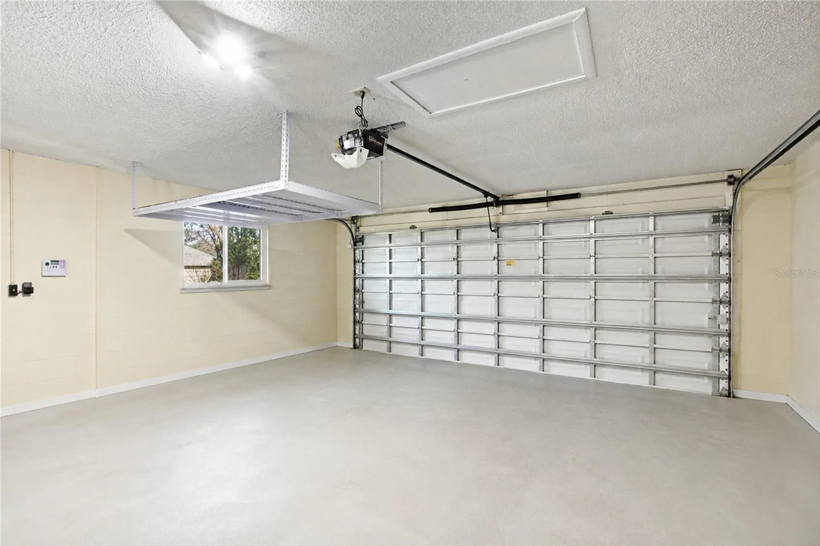2-car garage (photo enhanced to remove items)