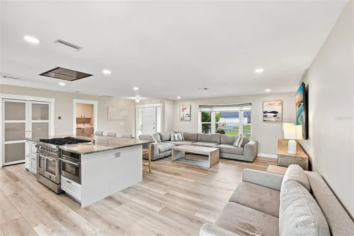 Kitchen and Living Room (oversized island, custom pantry, 8 burner gas range)