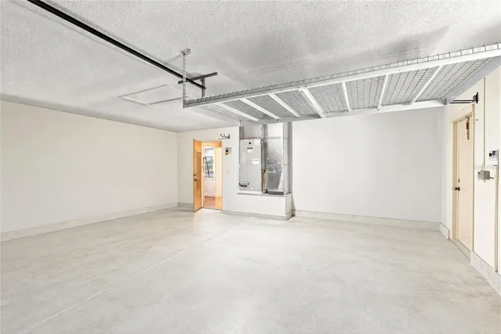 2-car garage (photo enhanced to remove items)