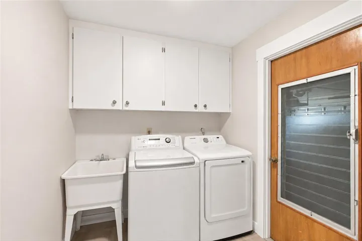 Laundry Room with laundry tub (some wall items removed virtually)