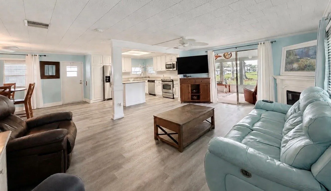 Living room to kitchen and dining room all open