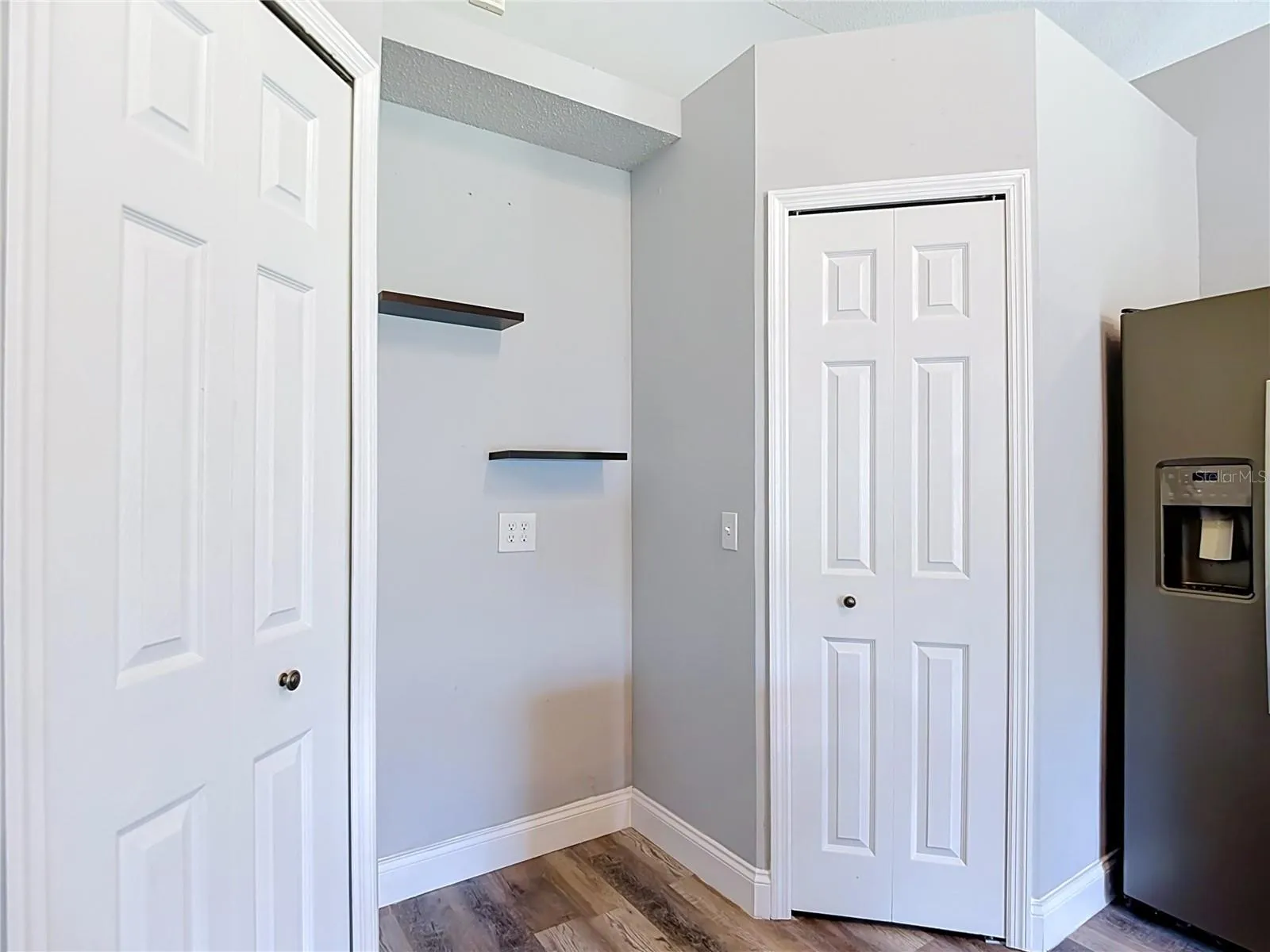 Kitchen boasts two closet pantries