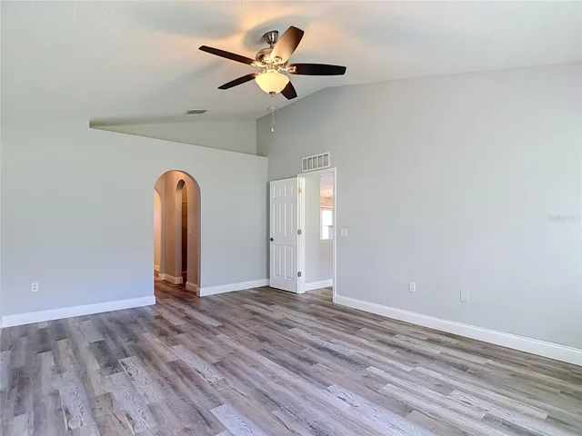 Primary bedroom with two walk-in closets and en suite bathroom