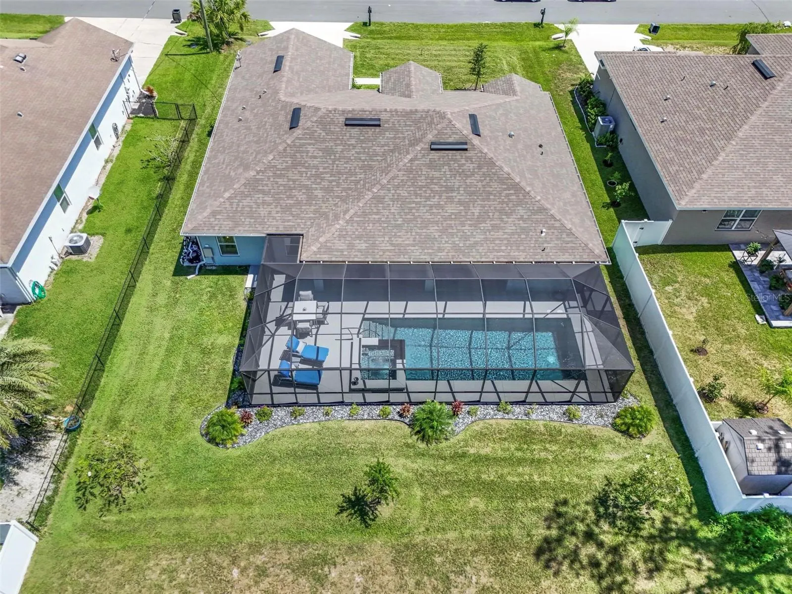 Large screened pool and spacious backyard
