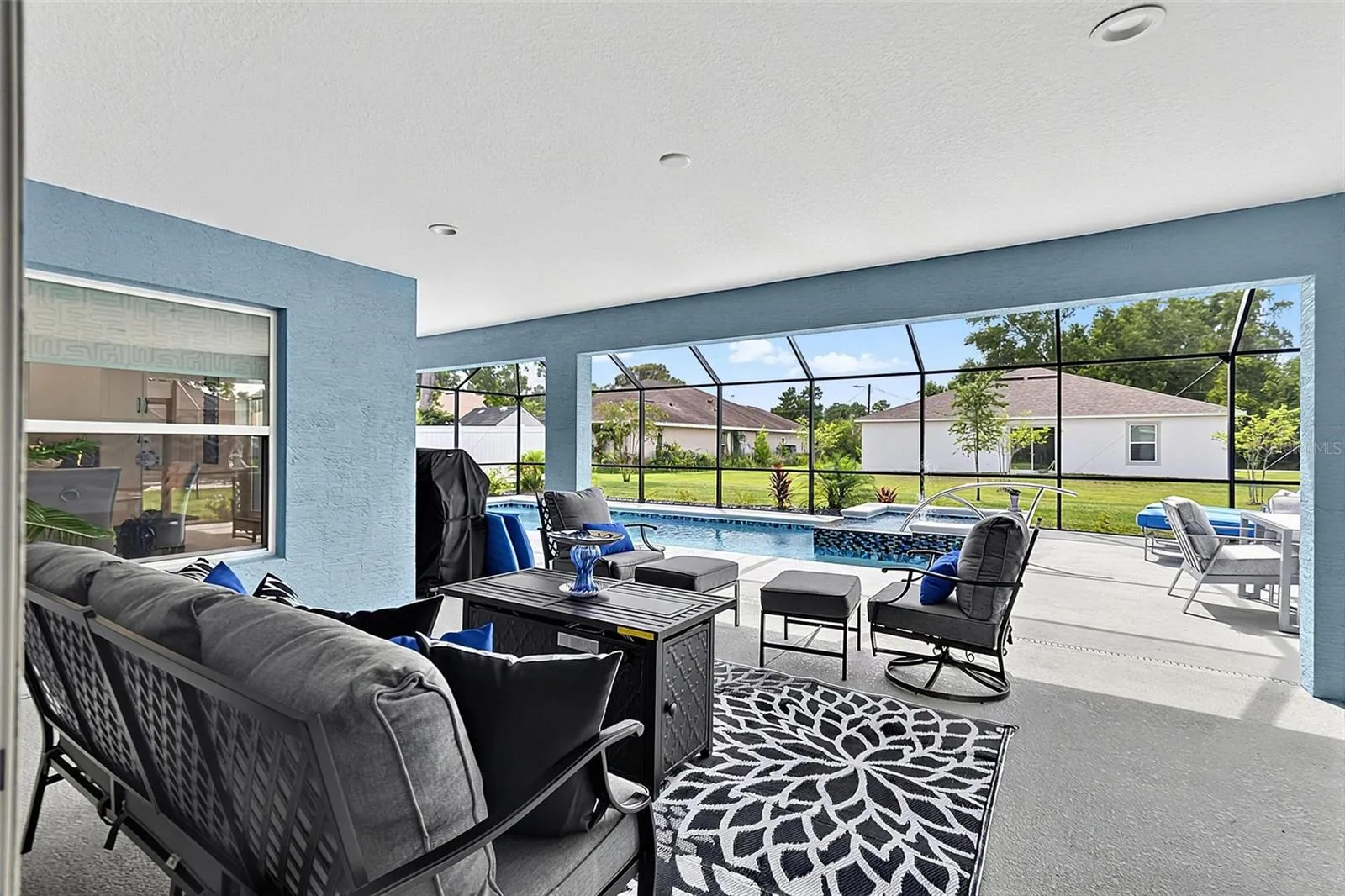 Expansive covered lanai for pool parties