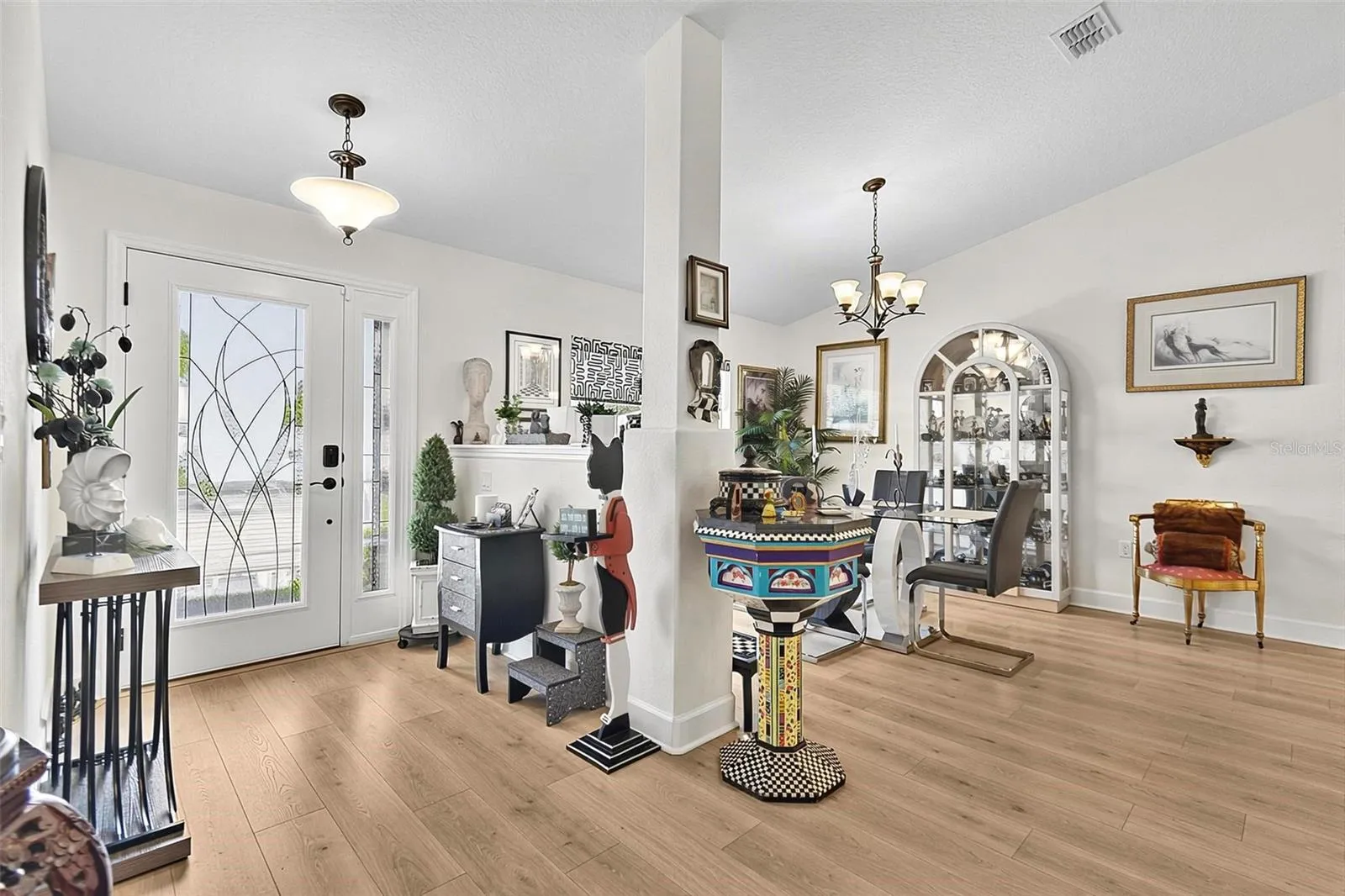 Decorative full light front door and side light