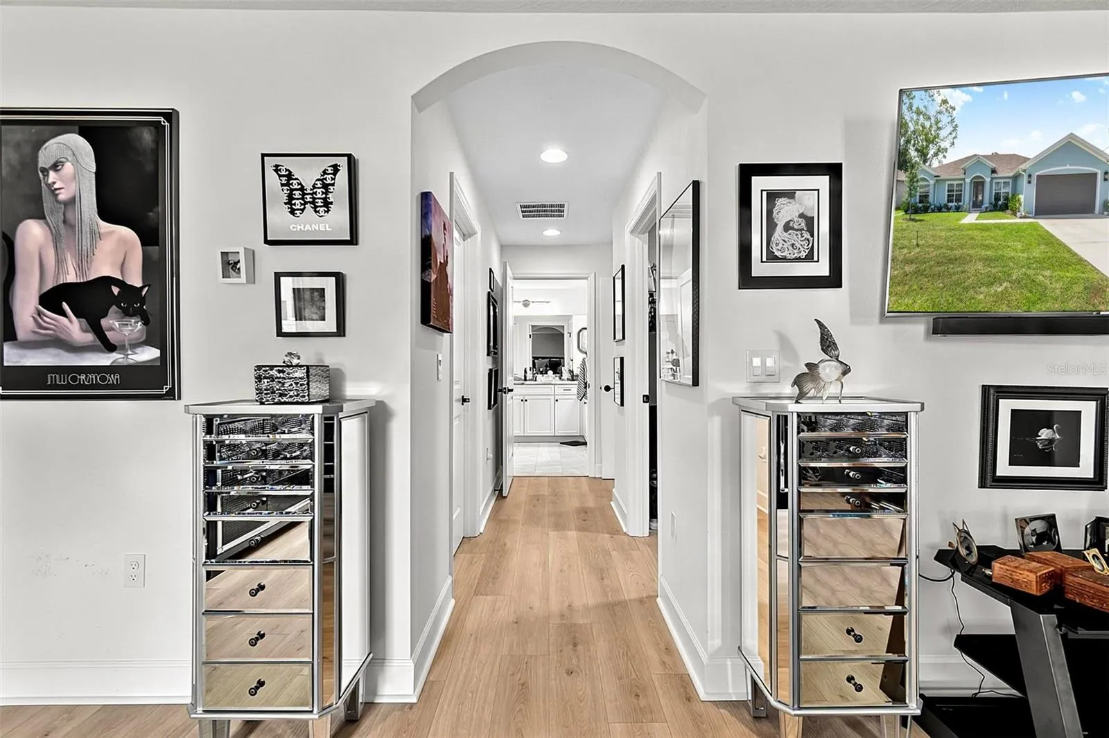 Hall leading to Primary bath and two walk in closets