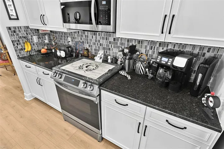 Upgraded stainless steel appliances less than 2 yrs old