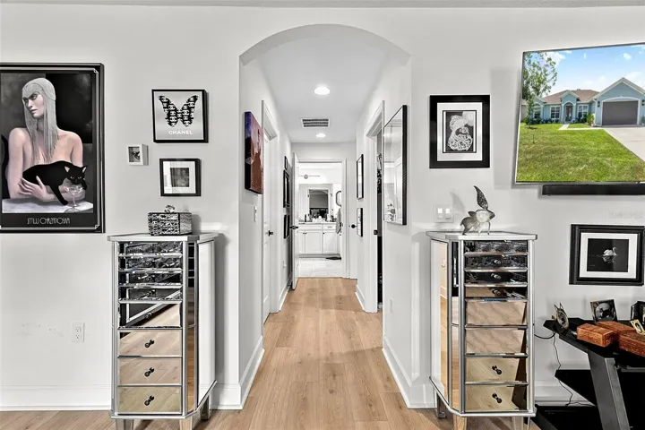 Hall leading to Primary bath and two walk in closets
