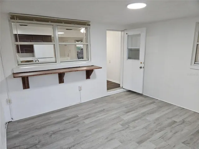 View of Florida Room with doorway to Kitchen