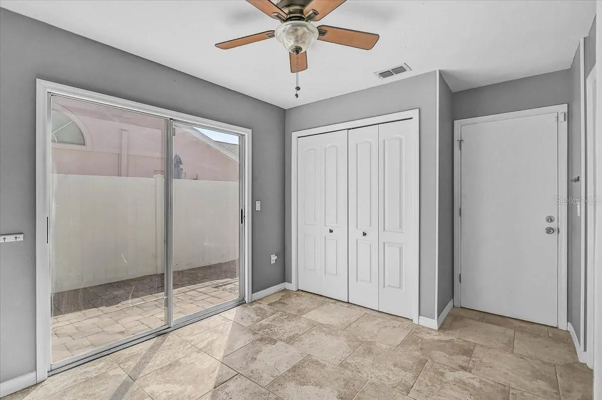 Dinette and Pantry to Garage Door and Sliding Door to Side Patio 35' x 9'