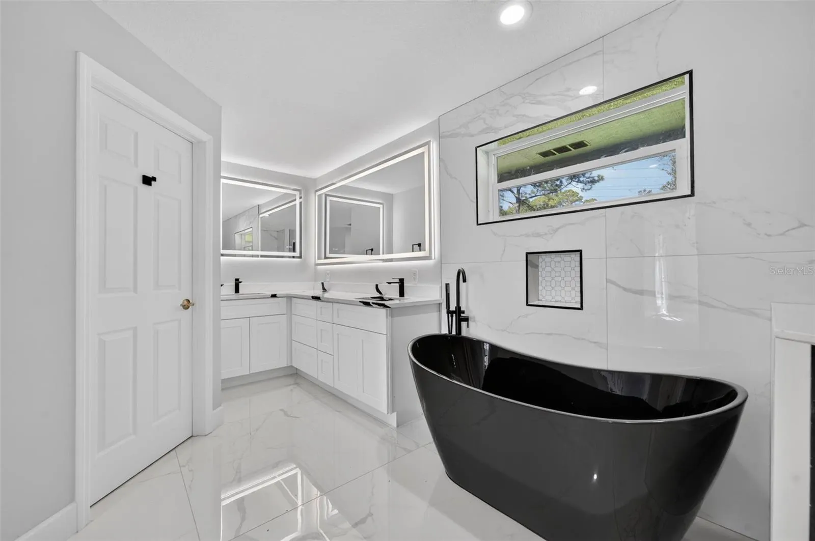 Updated Flooring, Soaking Tub, Vanity, Quartz countertops