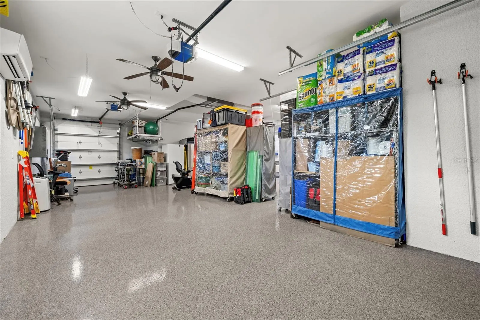 The 3rd garage door, also with added insulation, welcomes your golf cart.
