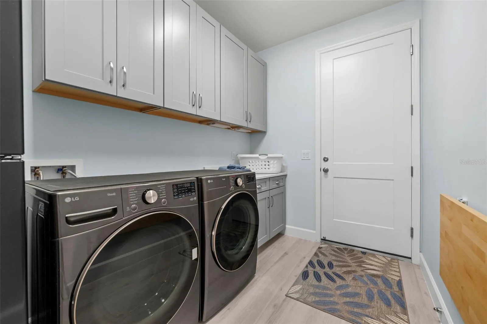 Quality continues with new(er) LG appliances, solid wood cabinetry, and a collapsible folding table.