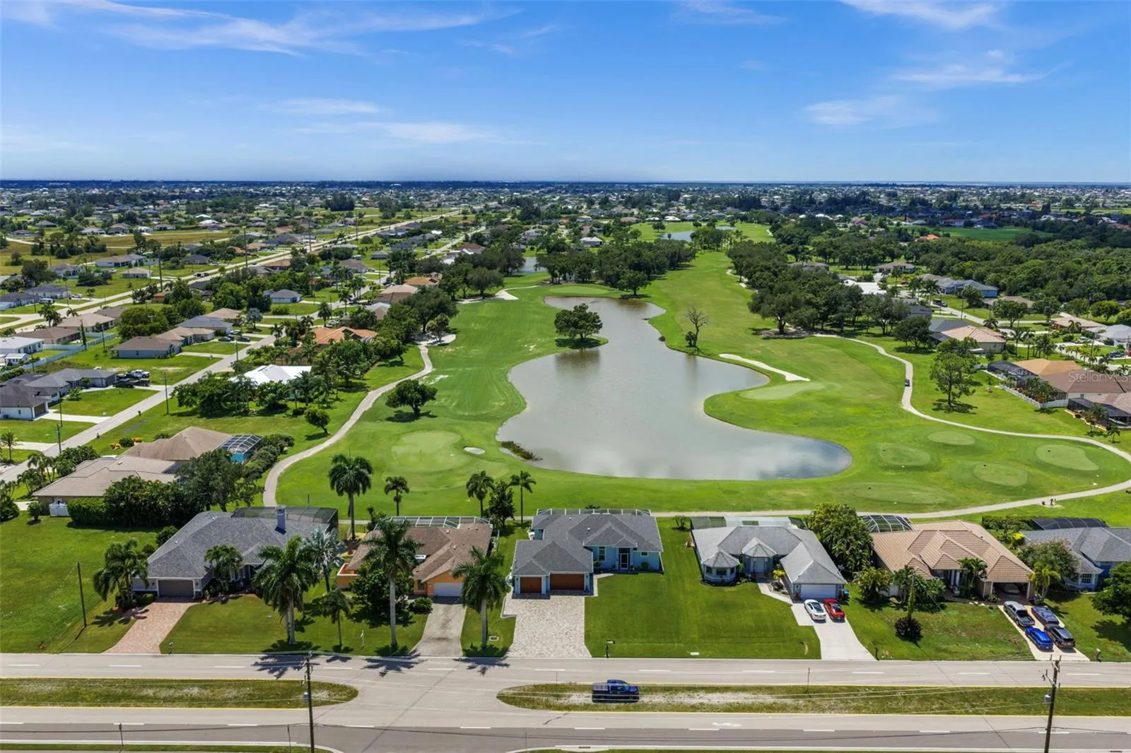 Enjoy the lake view from the oversized, southern facing rear facing lanai.