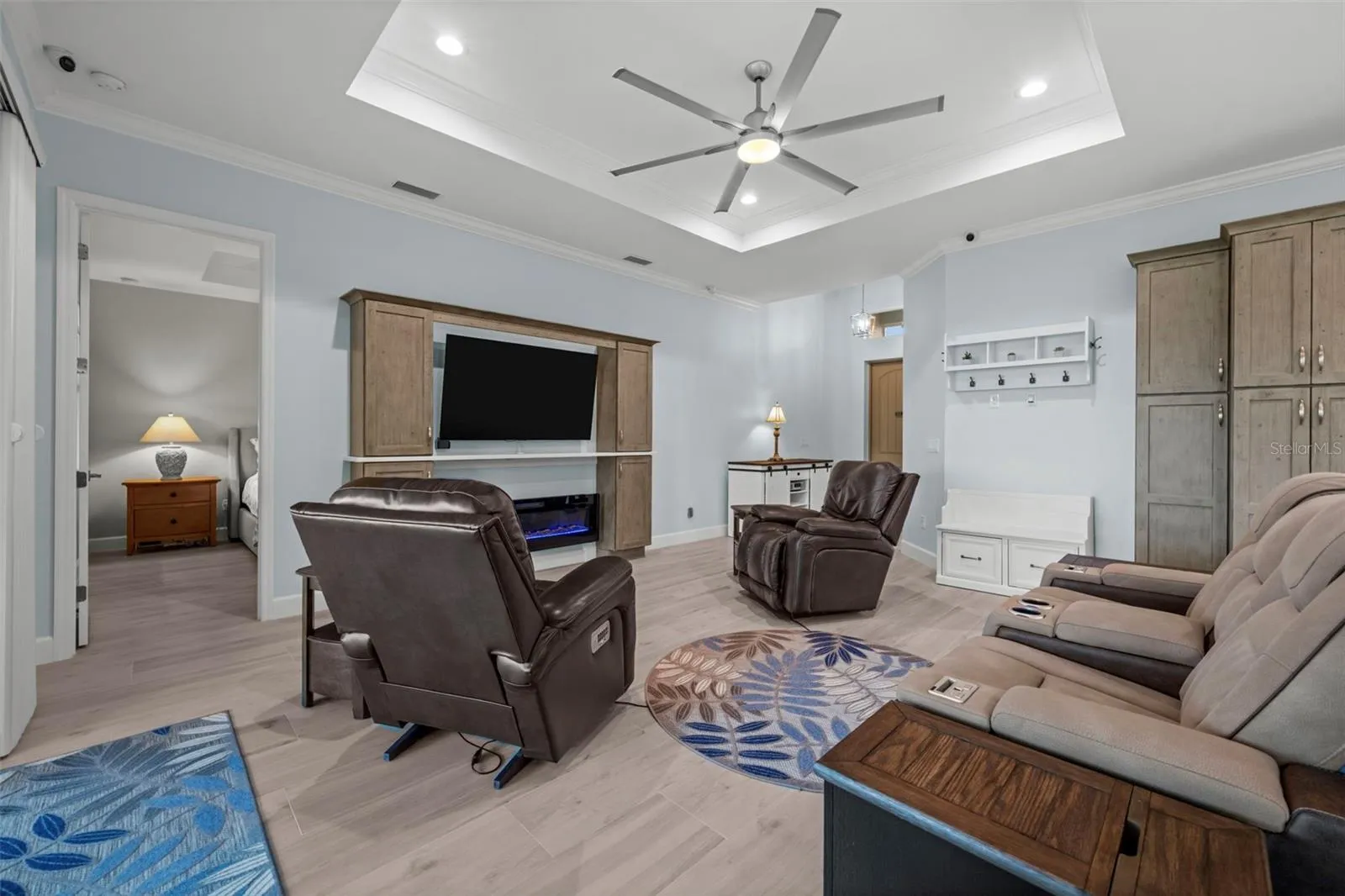 Tray ceiling with a detailed crown molding inlay.