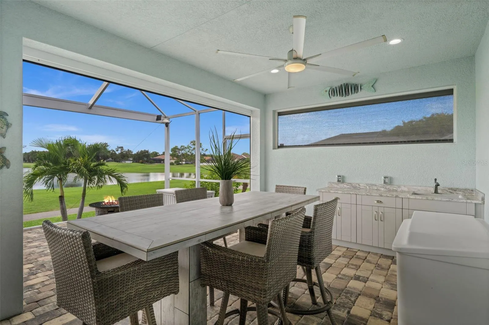Let's bring the indoors - outdoors while enjoying the outdoor kitchen and the built-in gas fire pit.