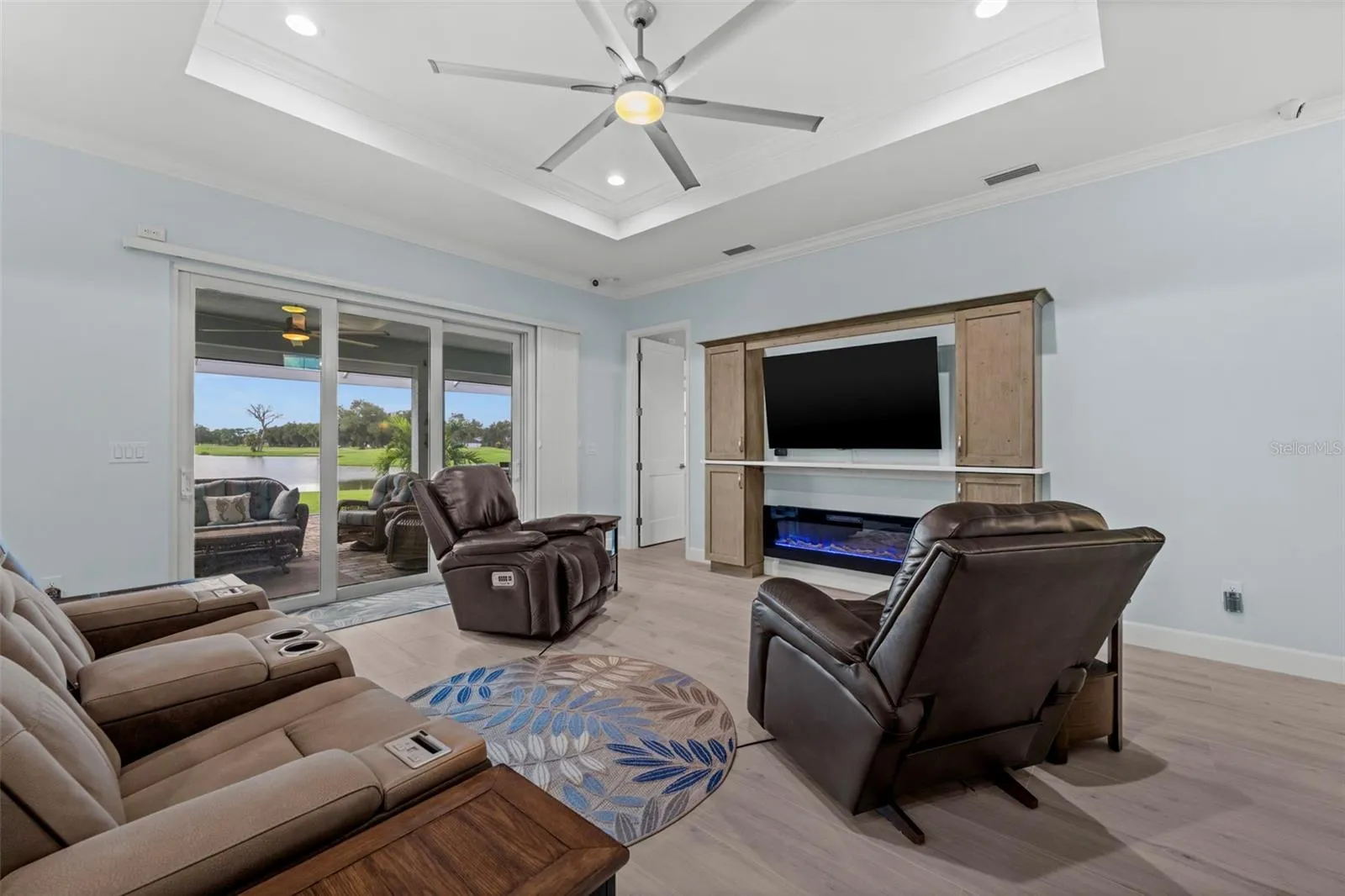 Enjoy golf course and lake views from the comfort of your favorite chair.