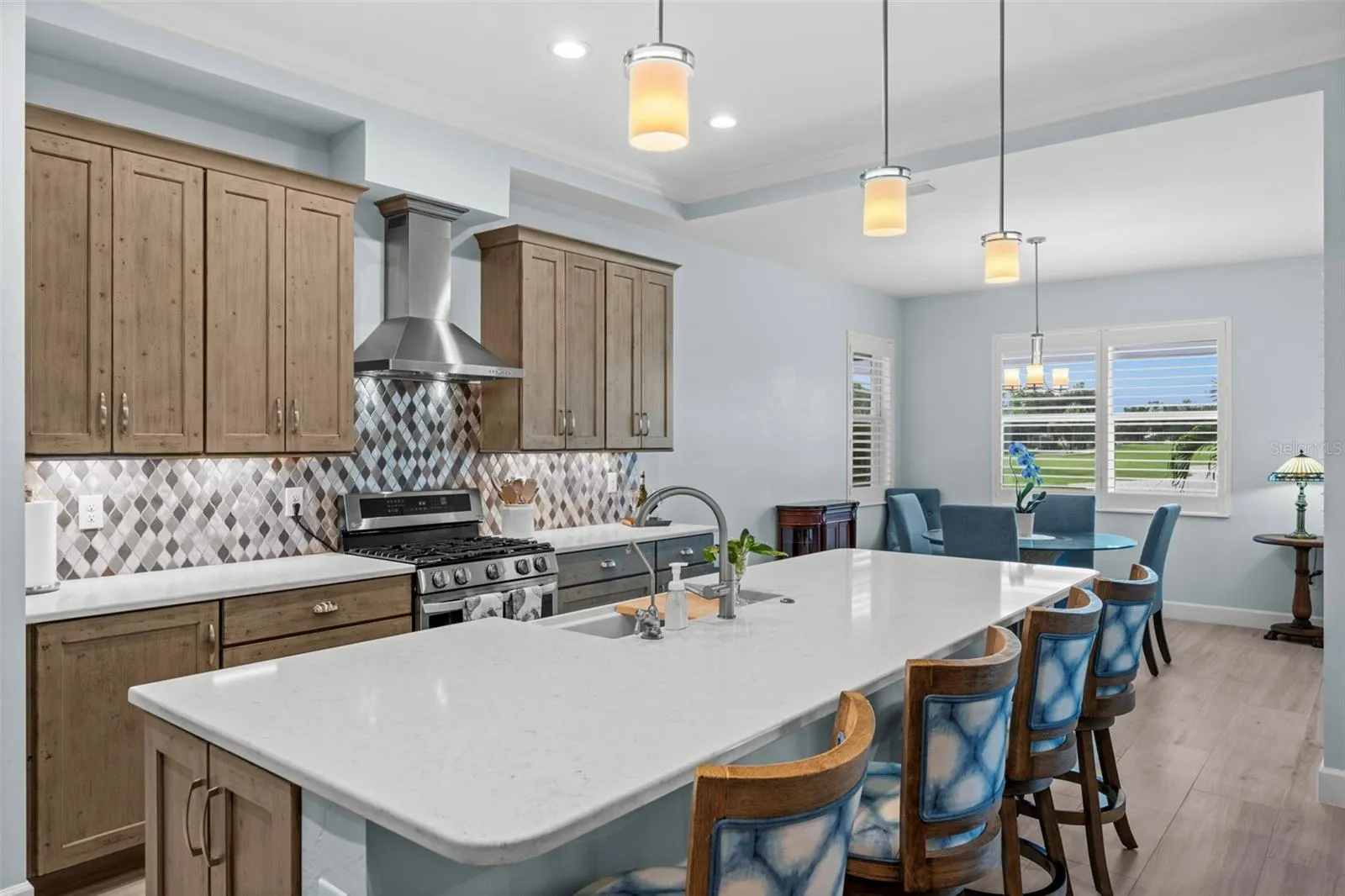Modern, bright, cheerful. Note the plantation shutters.