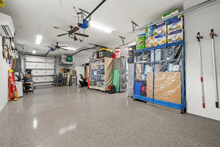 The 3rd garage door, also with added insulation, welcomes your golf cart.