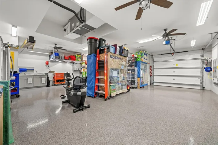 The very oversized 3 car garage is 1,039 SF! There are also 2 large hanging storage racks.