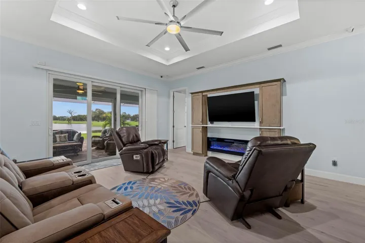 Enjoy golf course and lake views from the comfort of your favorite chair.