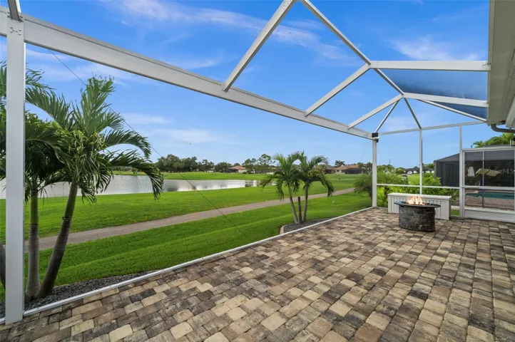 Perfectly positioned on the 12th hole of Coral Oaks Golf Course. No charge for the entertainment through the XL picture window framed within the upgraded, heavy duty cage.