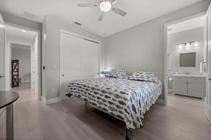 Bedroom No. 2 enjoys an ensuite bath and access to lanai.