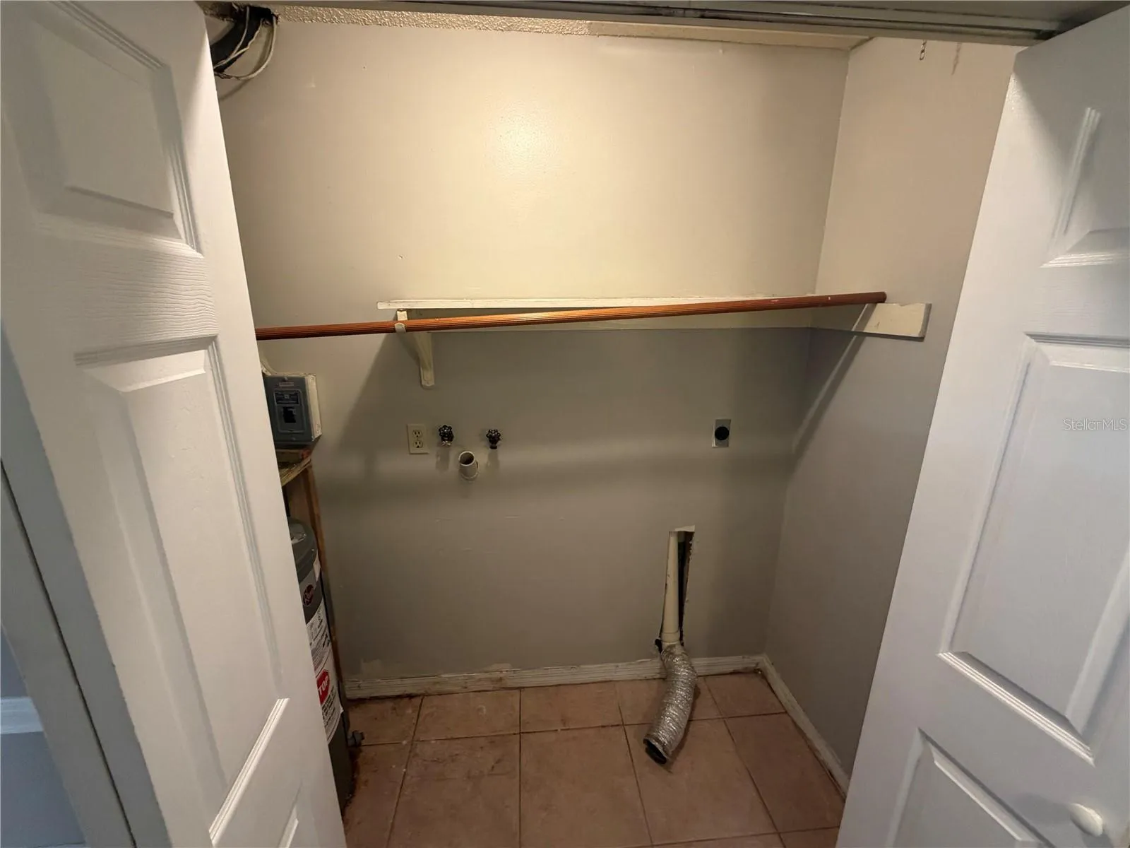 Laundry closet in hallway