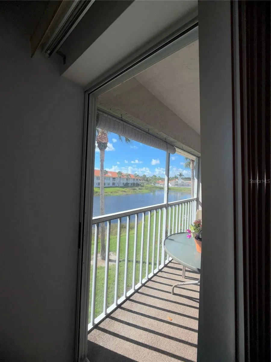 The master bedroom has a sliding glass door to the porch as well.