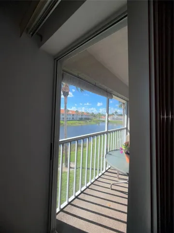 The master bedroom has a sliding glass door to the porch as well.