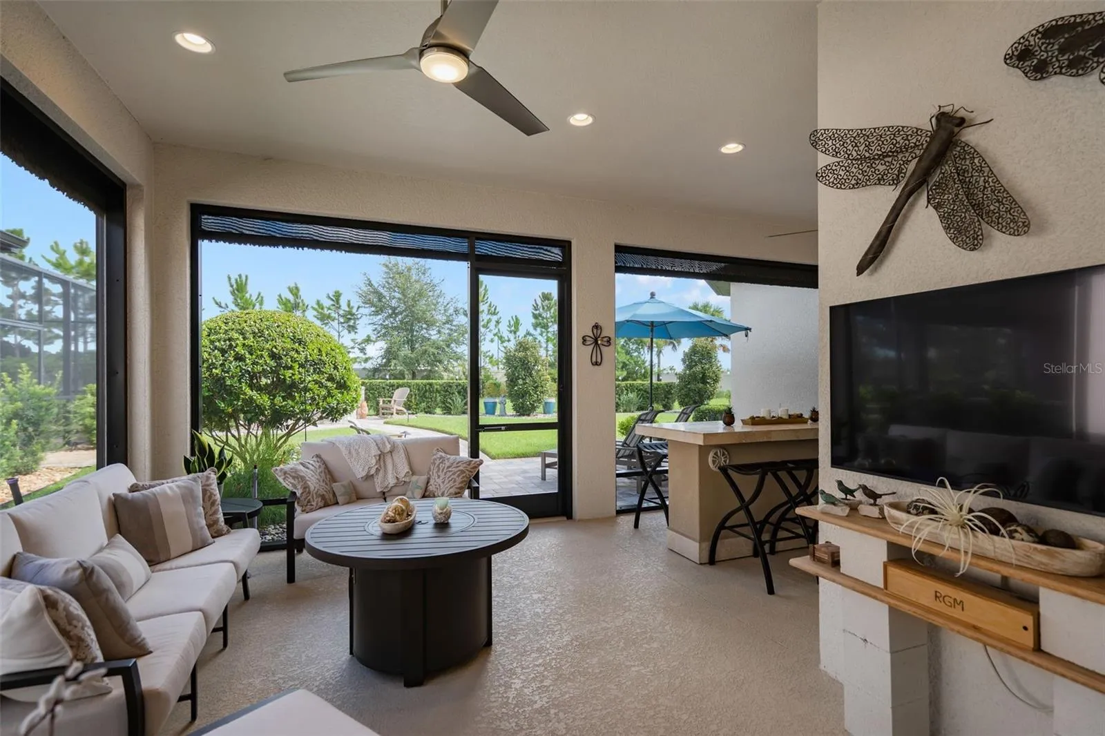 The screened lanai also has Power Roll Down Shades. Wait until you see what is around the corner.