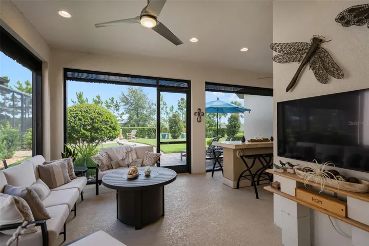 The screened lanai also has Power Roll Down Shades. Wait until you see what is around the corner.