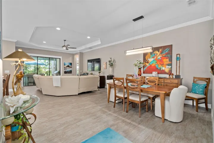 Dining room / Great room view. The 10' ceilings in addition to the tray's and crown molding add another dimension.