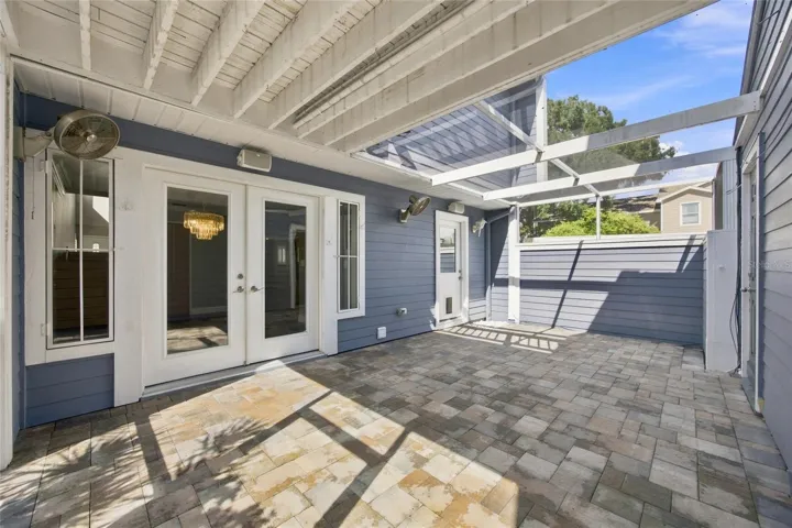 Screened porch between house and garage