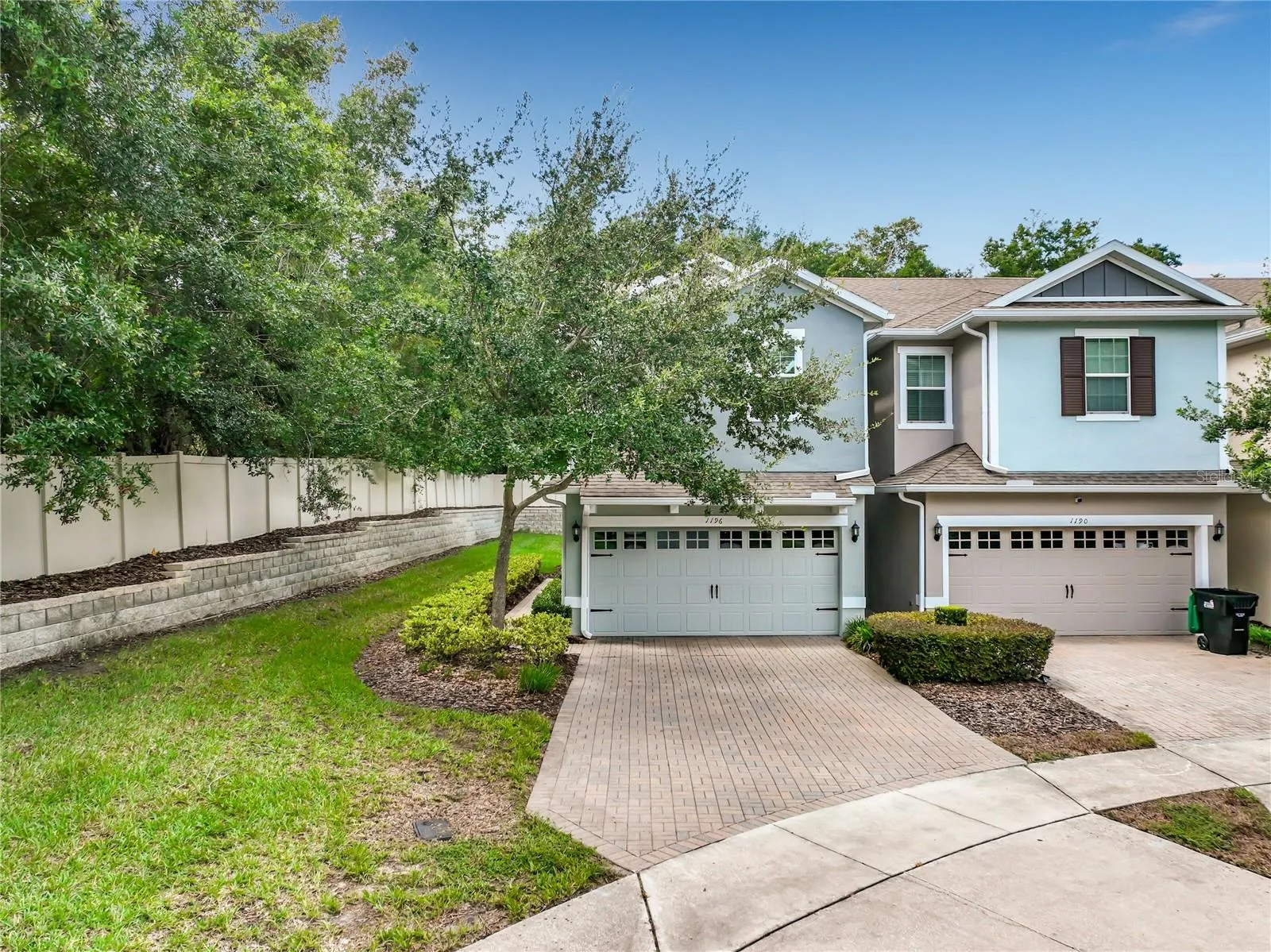 Super long driveway and large tree for shade
