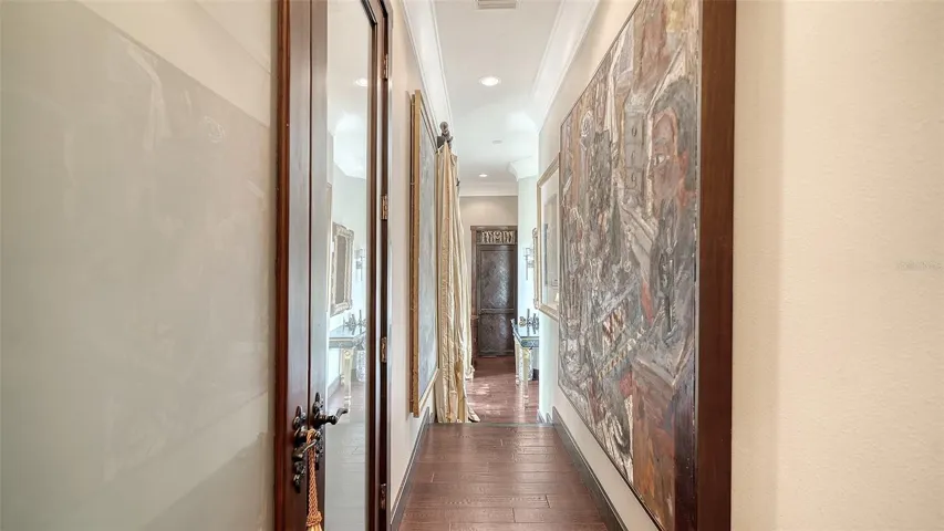Hall from 2nd and 3rd bedrooms to Laundry room and 2 car garage
