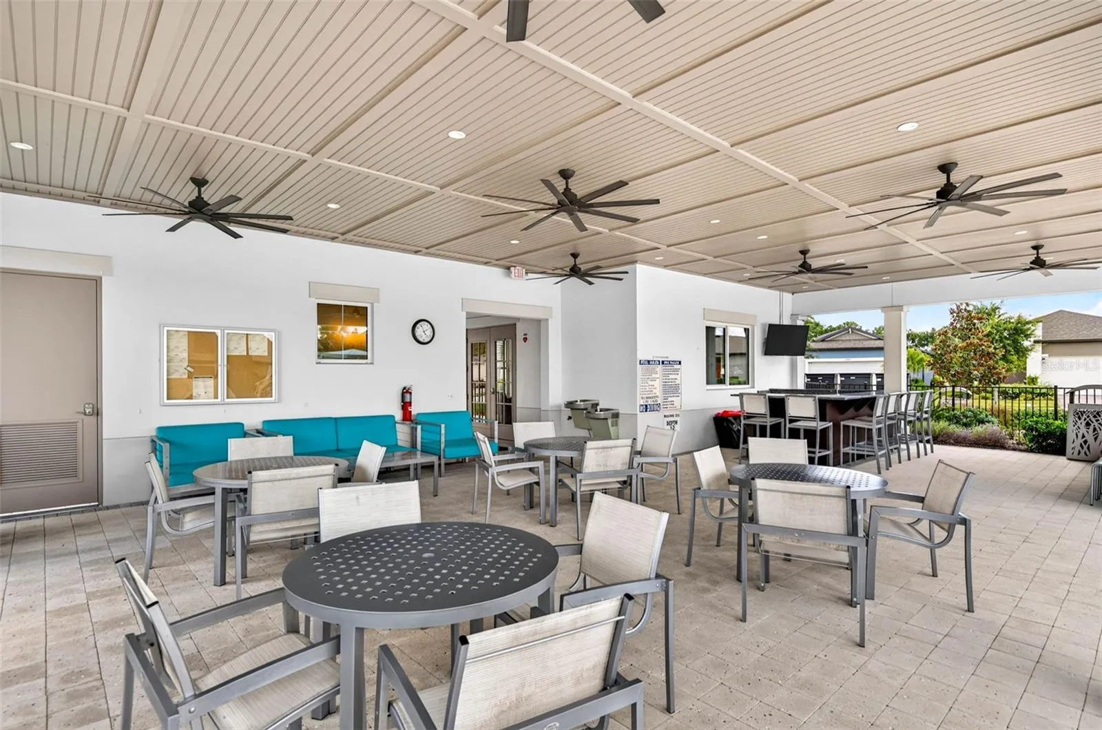 Expansive shaded sitting area with fans to keep you cool