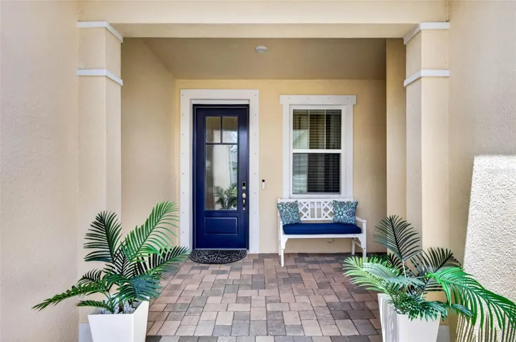 Welcoming porch and stylish glass front door