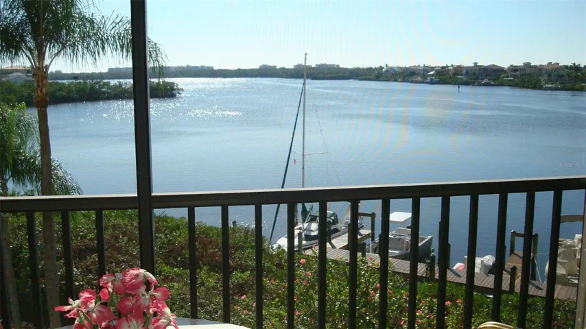 Screened Lanai overlooking expansive waterfront Back Bay to Gulf of Mexico