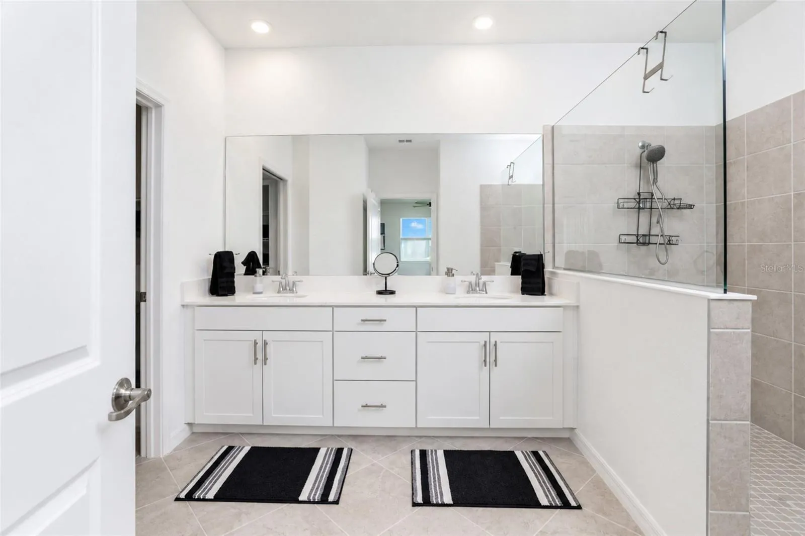 Spacious Primary Bath with Dual Vanities